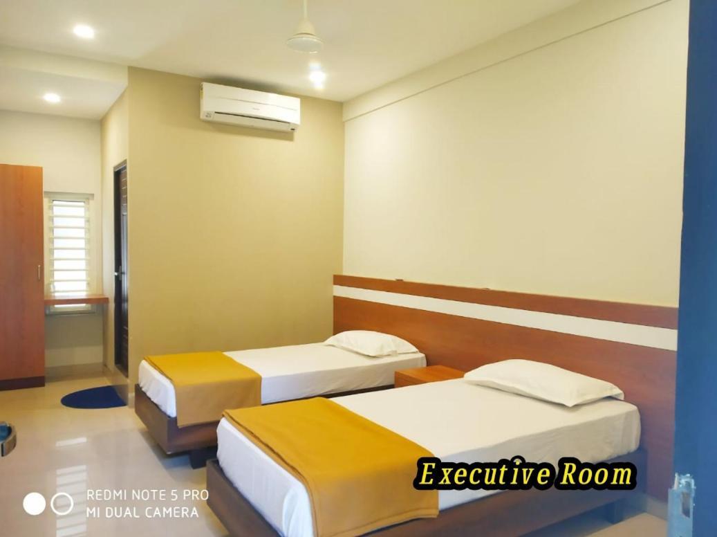 Tirur Tourist Home Extérieur photo